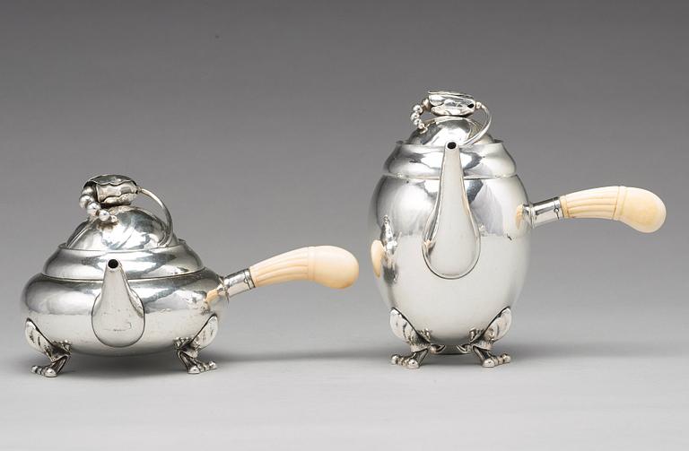 Georg Jensen, a four pieces of "Blossom" tea- and coffee set, Copenhagen 1918-1919, 830/1000 silver, design nr 2 and 100.