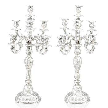 278. A pair of eight-light Louis XV-style silver candelabra, mark of Hermann Julius Wilm, Berlin, circa 1900.