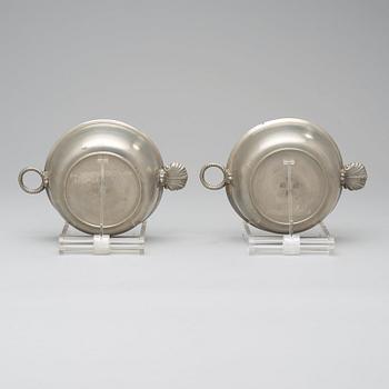 A pair of pewter food holders by M Leffler 1841.