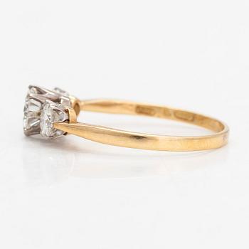 An 18K gold three-stone ring, with brilliant-cut diamonds totalling approximately 1.10 ct. W.Pettersson, Turku.