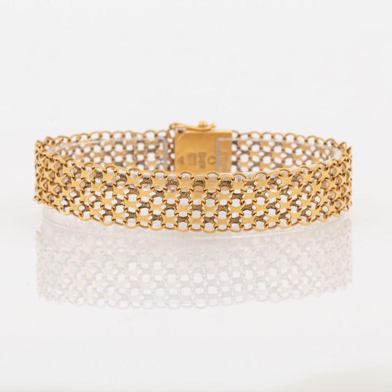 18K gold bracelet.