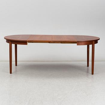 a teak dining table from the second half of the 20th century.