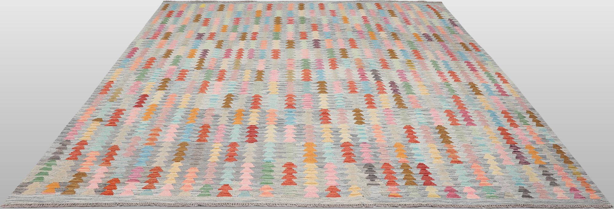 A Kilim rug, approx. 294 x 252 cm.