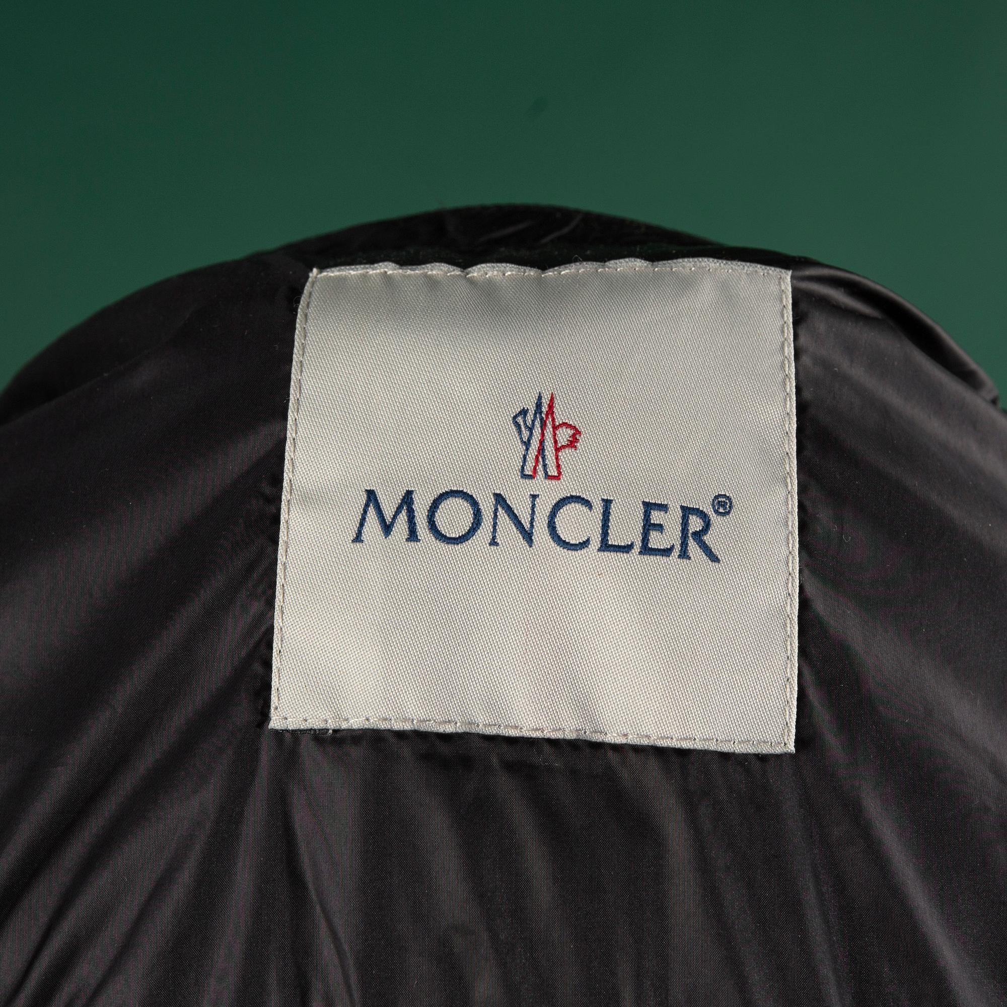 A jacket by MONCLEAR, size 3.
