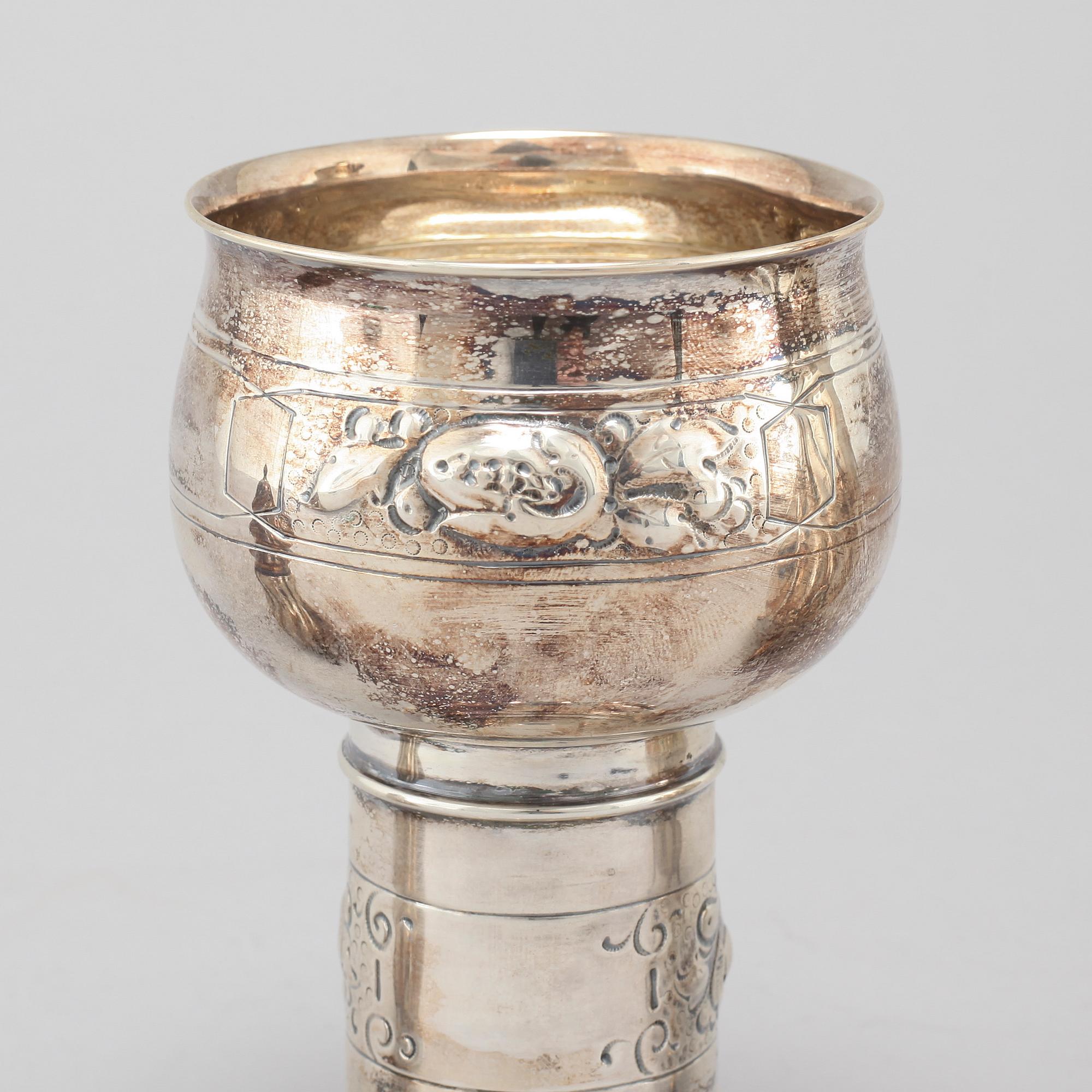 Three silver shakers and chalice, K. Anderson and import marks, first half of the 20th century.