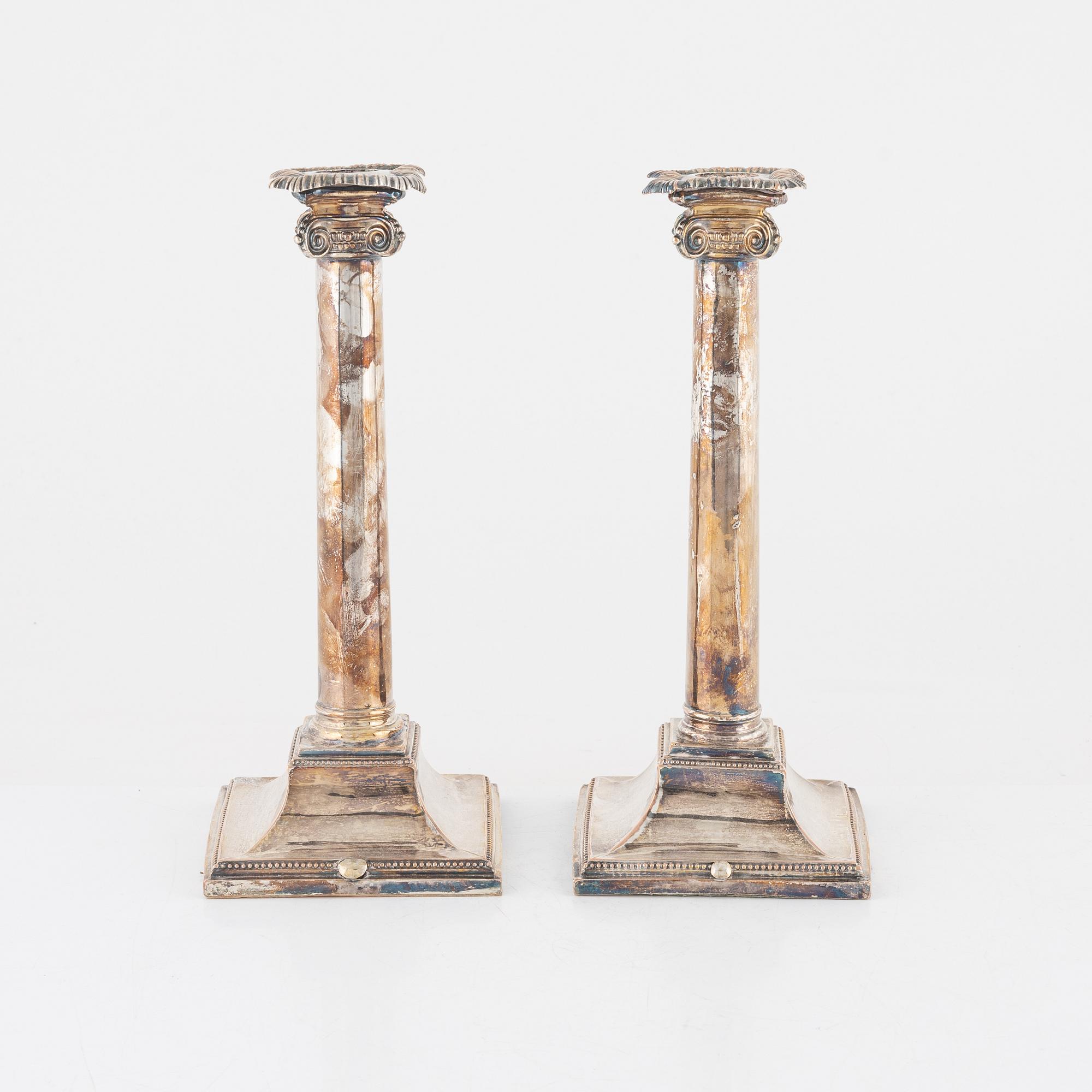 A pair of silver-plate candlesticks, early 20th century.