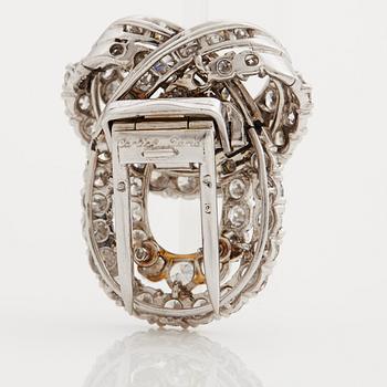 A 1940/50's clip brooch by Cartier, Paris set with brilliant cut diamonds.