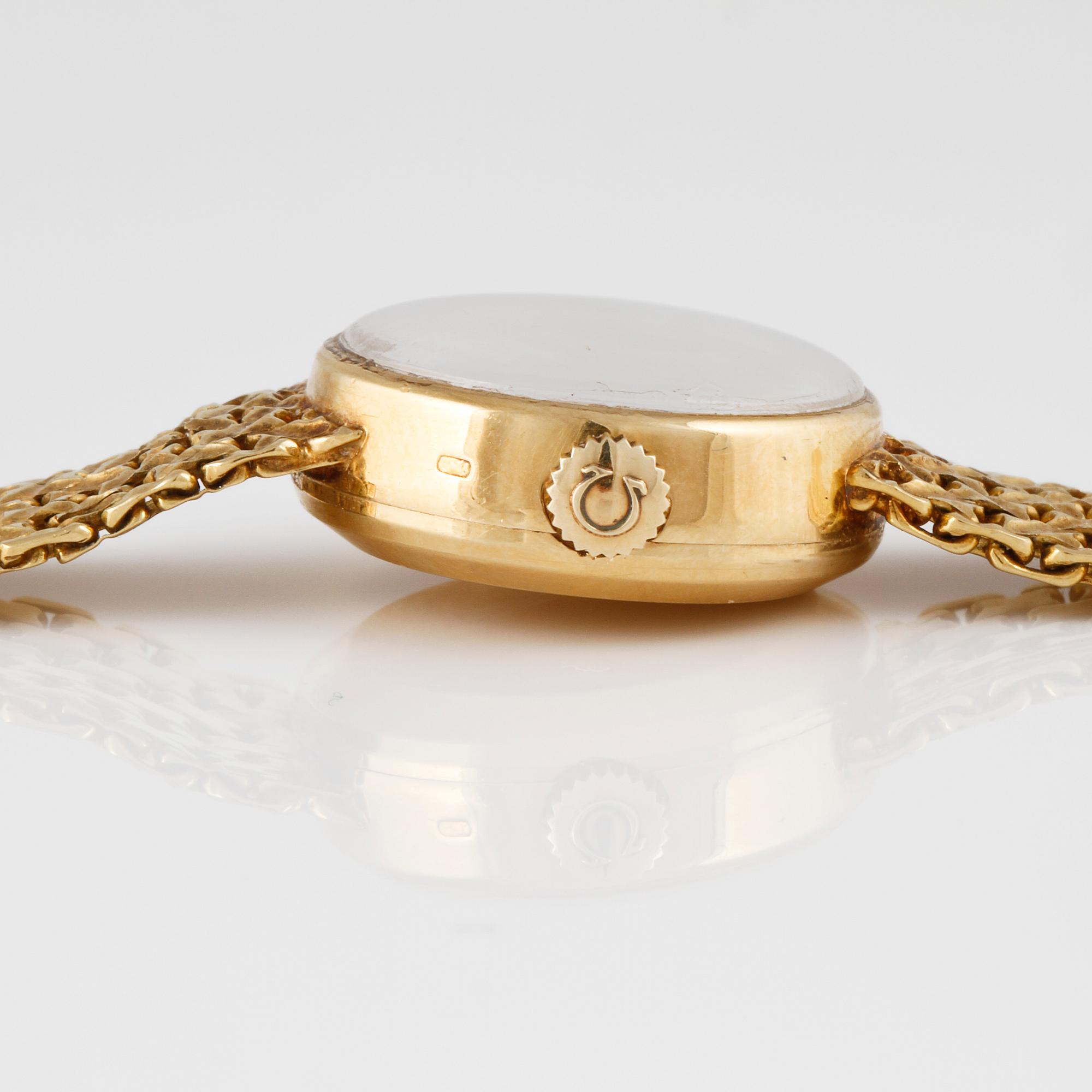 ARMBANDSUR, dam, guld, "Ladymatic" Omega. Total vikt 39 g.