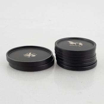 Eight coasters, Isolit with silver inlays, 1937-53.