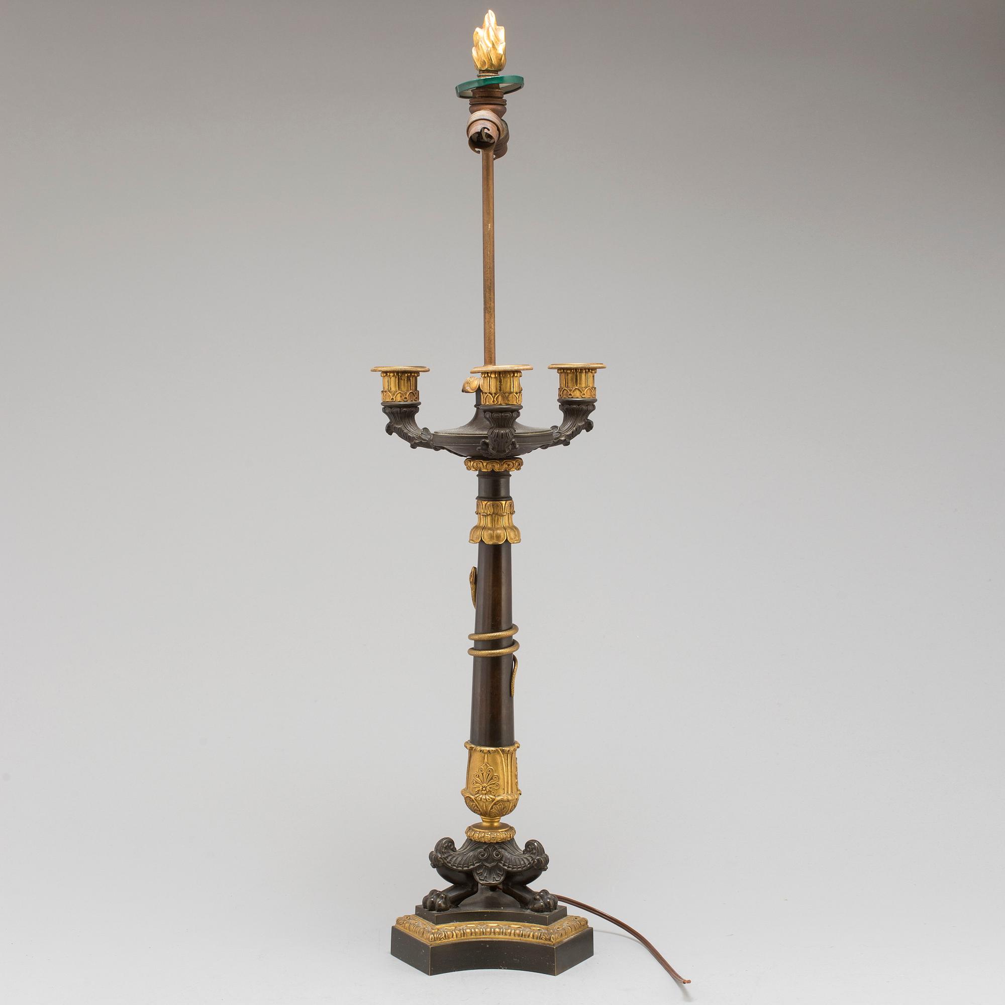 A first half of the 19th century bronze table lamp.