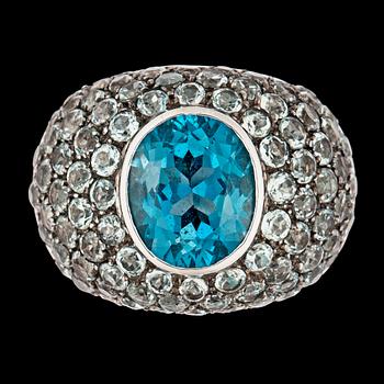 1176. A blue topaz and light blue sapphires.