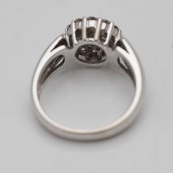 18K white gold ring with diamonds.