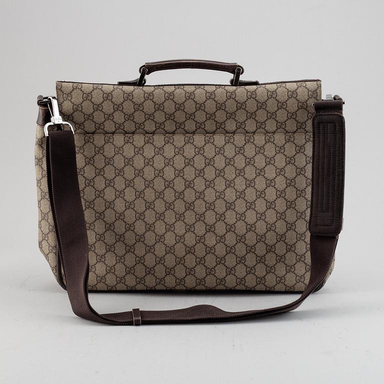 Gucci, a messenger bag.