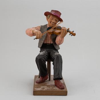 HERMAN ROSELL, a painted wooden sculpture.