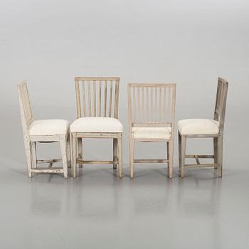 A SET OF 4 PIN SIMILAR CHAIRS.