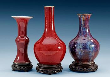 A set of three flambé- and copper-red glazed vases, Qing dynasty. (3).