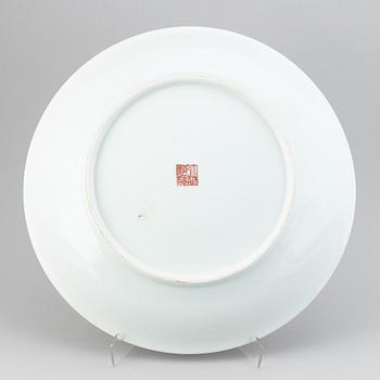 A large Chinese dish with a fierce five clawed dragon, modern.