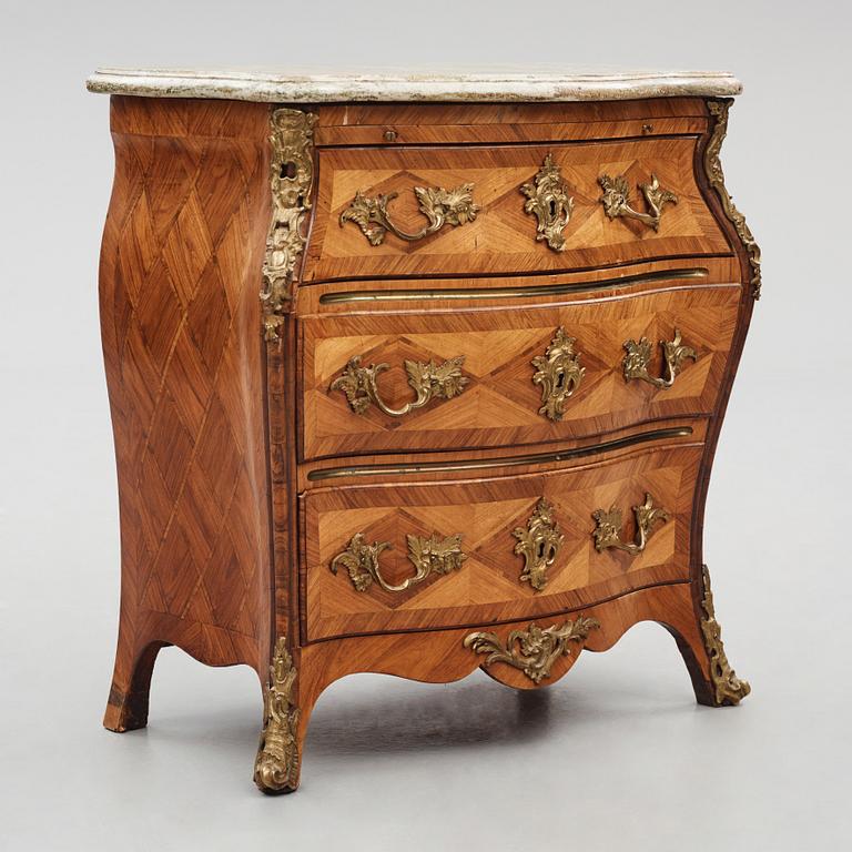 A rococo parquetry and gilt-brass mounted commode by C. Linning (master 1744-1779).