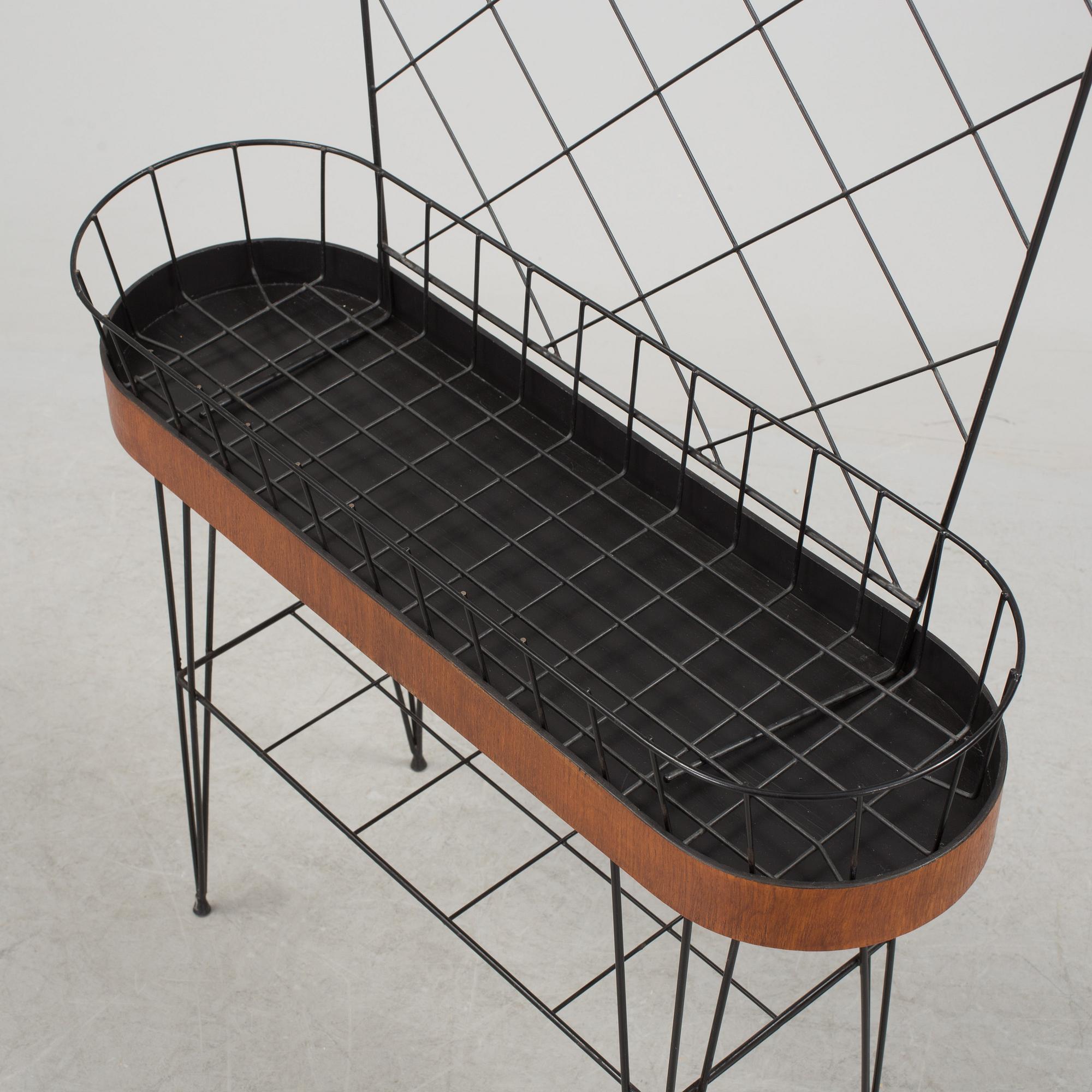 A mid 20th century flower table.