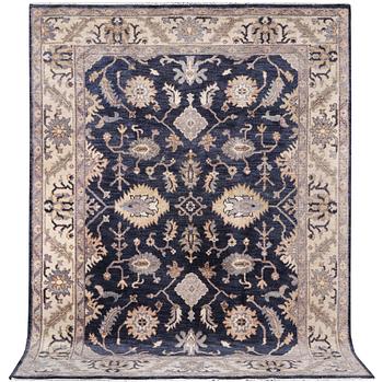 A Mamluk design carpet, c. 305 x 245 cm.