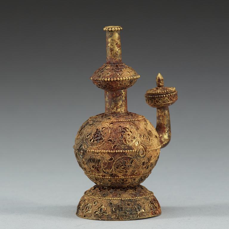 A gilt filigree kendi, Ming dynasty.