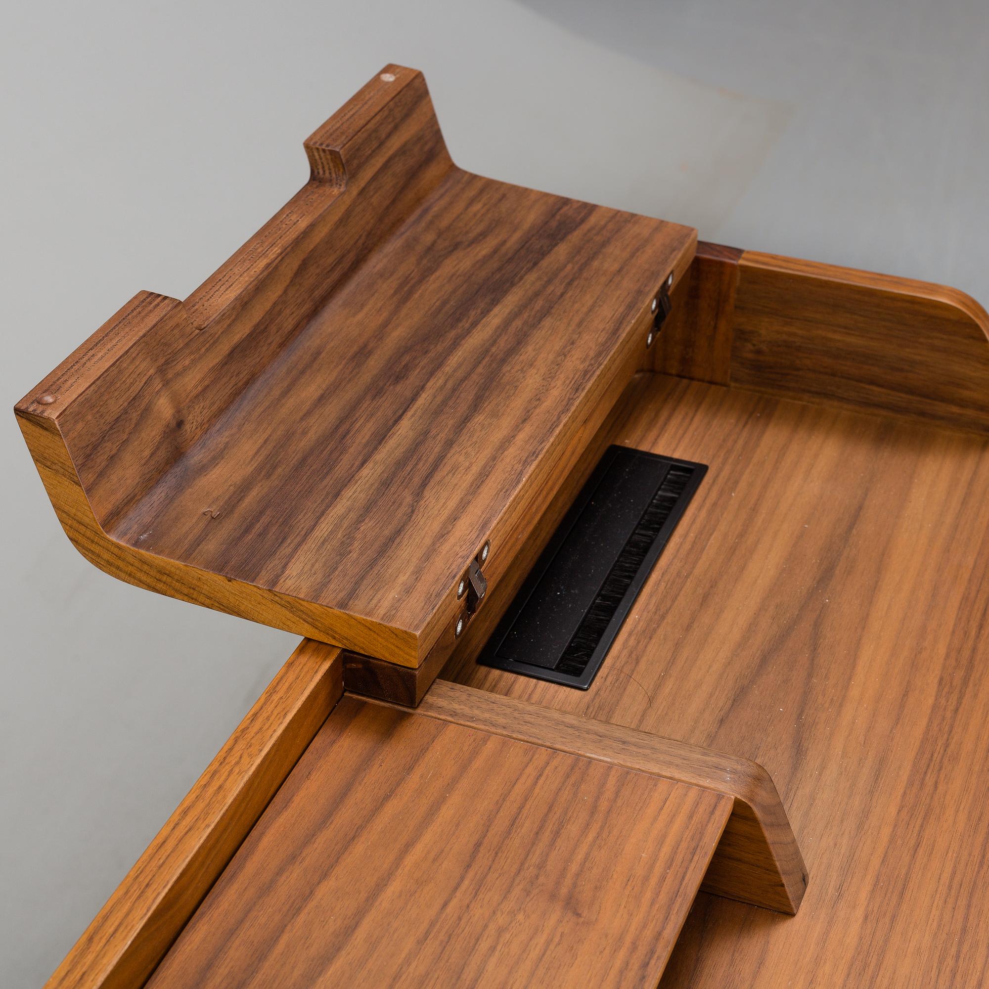 A 21st Century walnut 'Saffo' writing desk by Carlo Ballabio, from Porada.