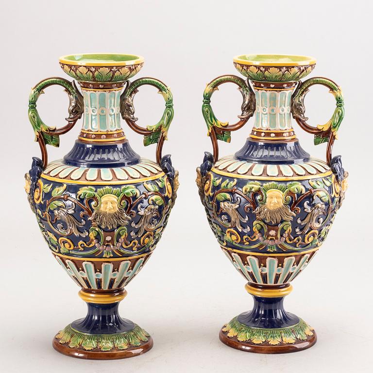 A pair of majolica urns around 1900.