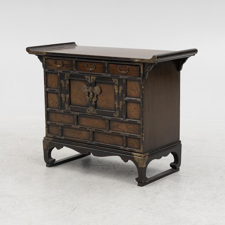 A Chinese hardwood cabinet, early 20th century.