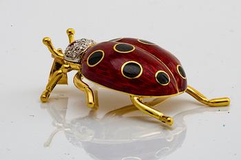 PENSANT 18k gold, brilliant-cut diamonds, 2 rubies and enamel, approx 4 x 3 cm.