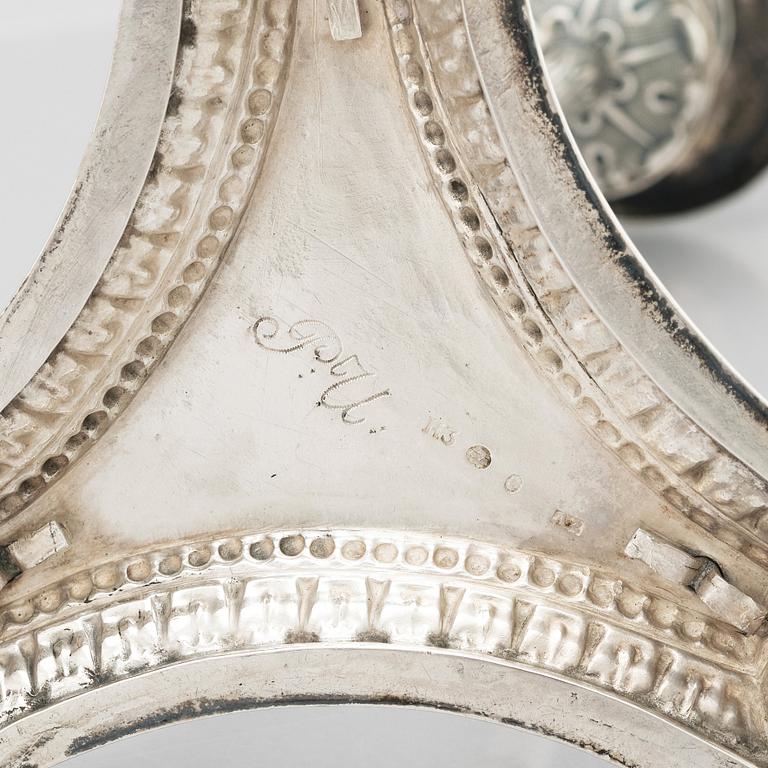 Four Swedish early 19th Century silver candlesticks, mark of Adolf Zethelius, Stockholm 1814 and 1818.