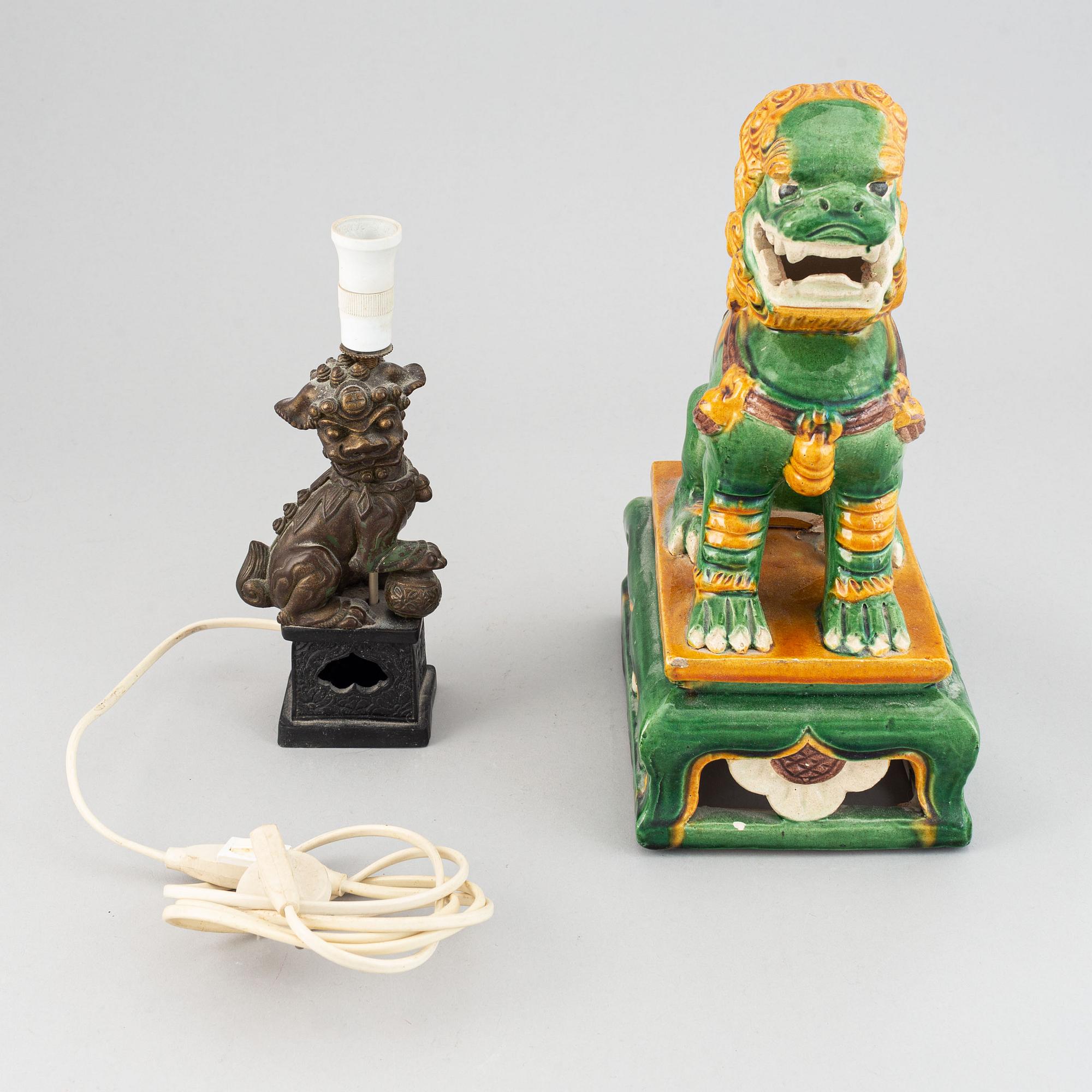 Two Chinese figures of buddhist lions, 20th Century.