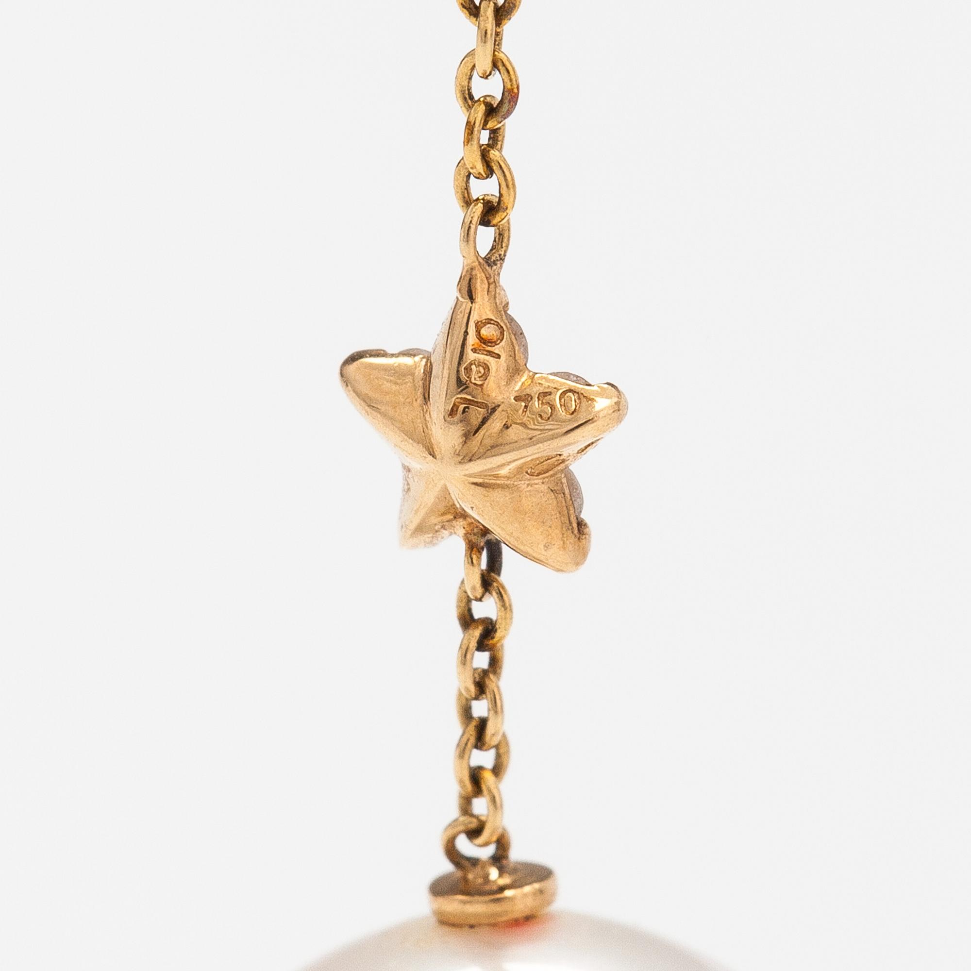 OLE LYNGGAARD, An 18K gold earring pendant "Shooting stars" with a tahiti pearl and diamonds ca. 0.06 in total. Denmark.