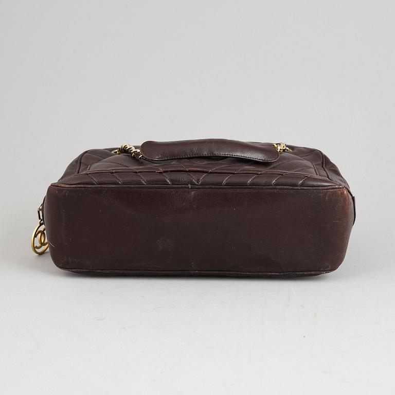 Chanel, a burgundy leather handbag, 1989-91.