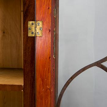 A 1830s/40s mahogany book case cabinet.