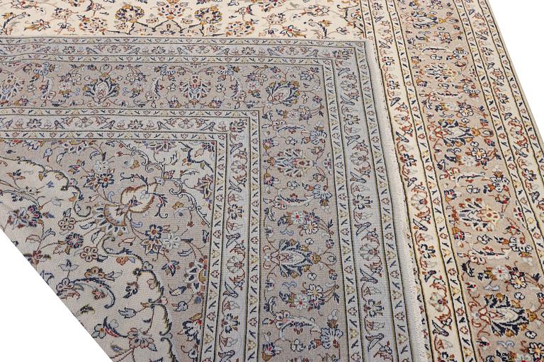 A Keshan carpet, c. 355 x 240 cm.