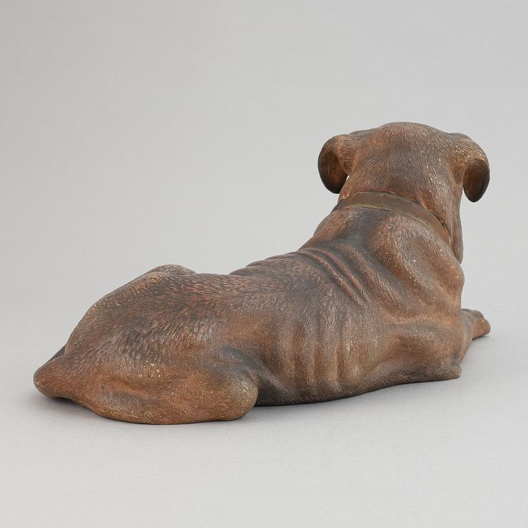 A ceramic sculpture in the shape of a dog, 20th century.