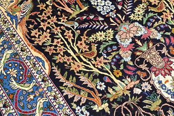 A figural Shahreza carpet, approx. 310 x 220 cm.