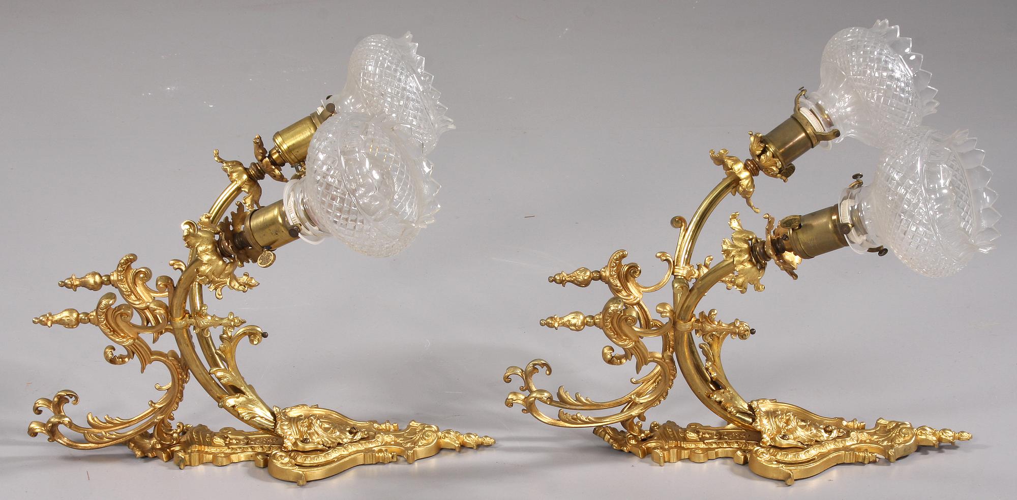 VÄGGLAMPETTER, ett par, Louis XV-stil, 1900-tal.