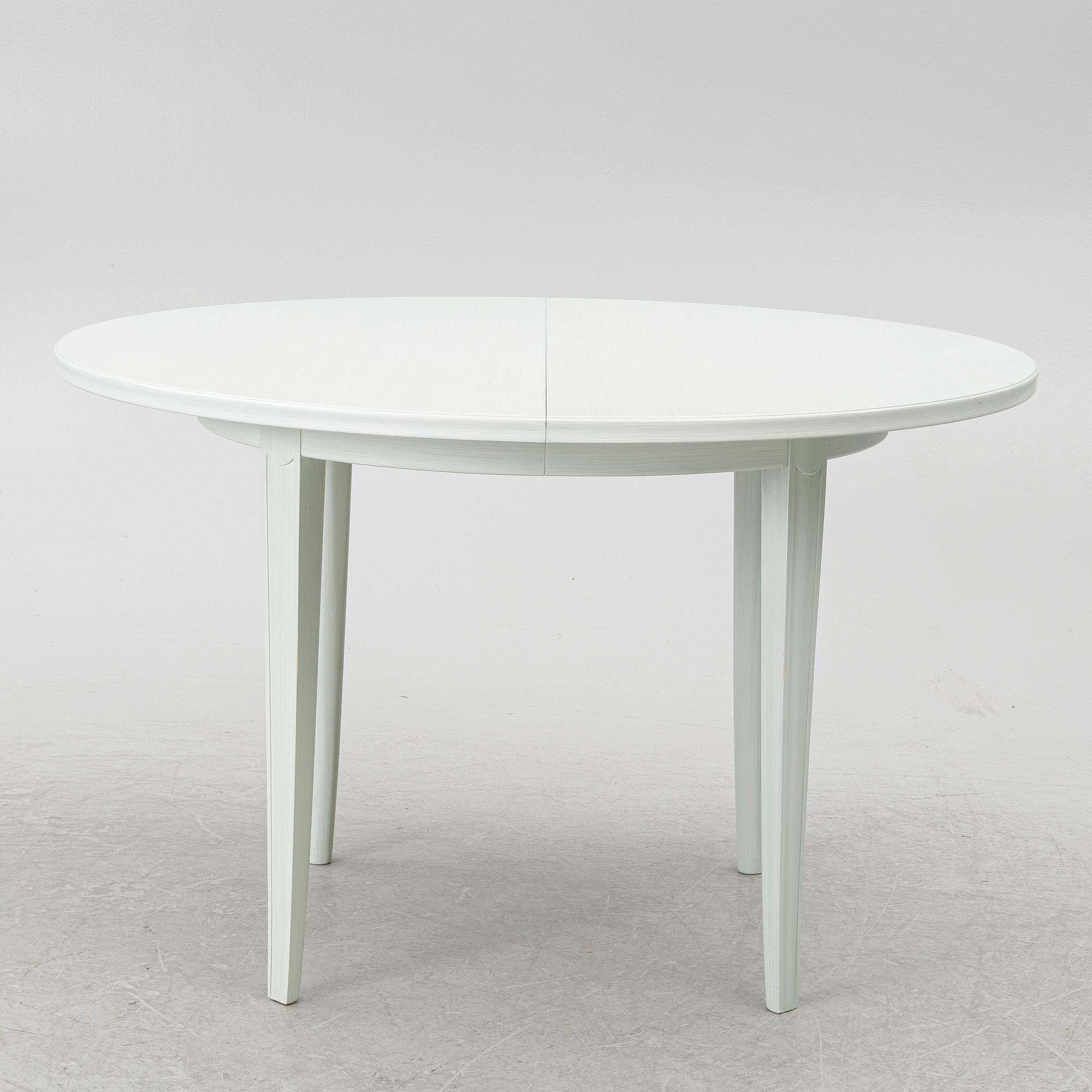 Carl Malmsten, a dinner table with six chairs, 'Brunnsviken', Sweden, second half of the 20th century.