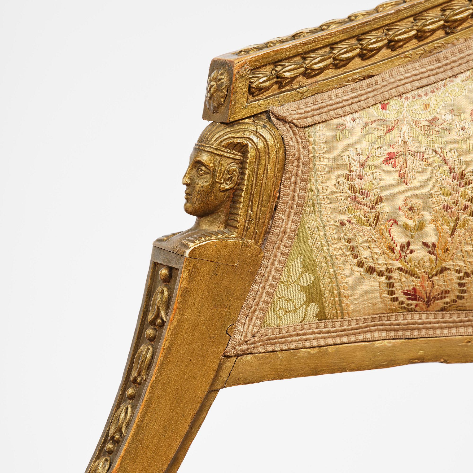 A pair of late Gustavian open armchairs attributed to E. Ståhl (master in Stockholm 1794-1820).