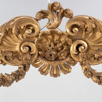 A Rococo style mirror, 19th Century.