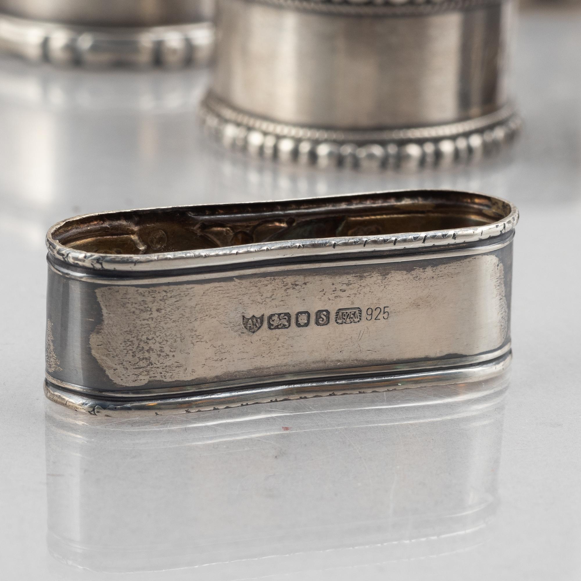 A collection of silver napkin rings, mostly England, Denmark (46 pieces).