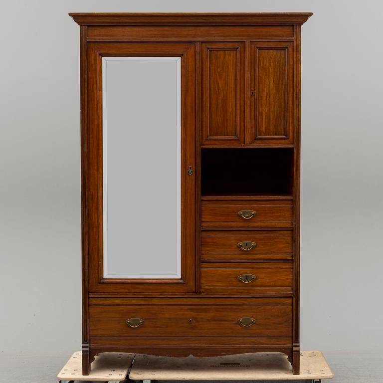 an early 20th century mahogany cabinet/wardrobe.