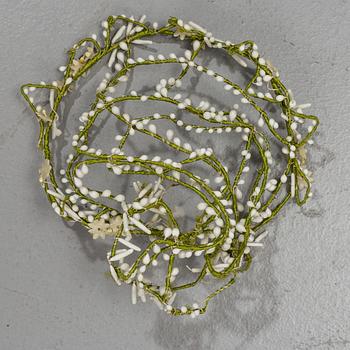 A satin wedding dress, circa 1935.
