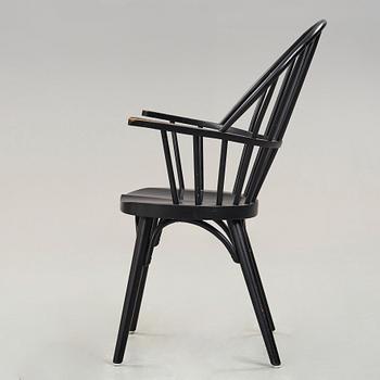 Uno Åhrén, a black stained birch chair, Gemla Sweden 1930's. This model was introduced at the 1930 Stockholm Exhibition.