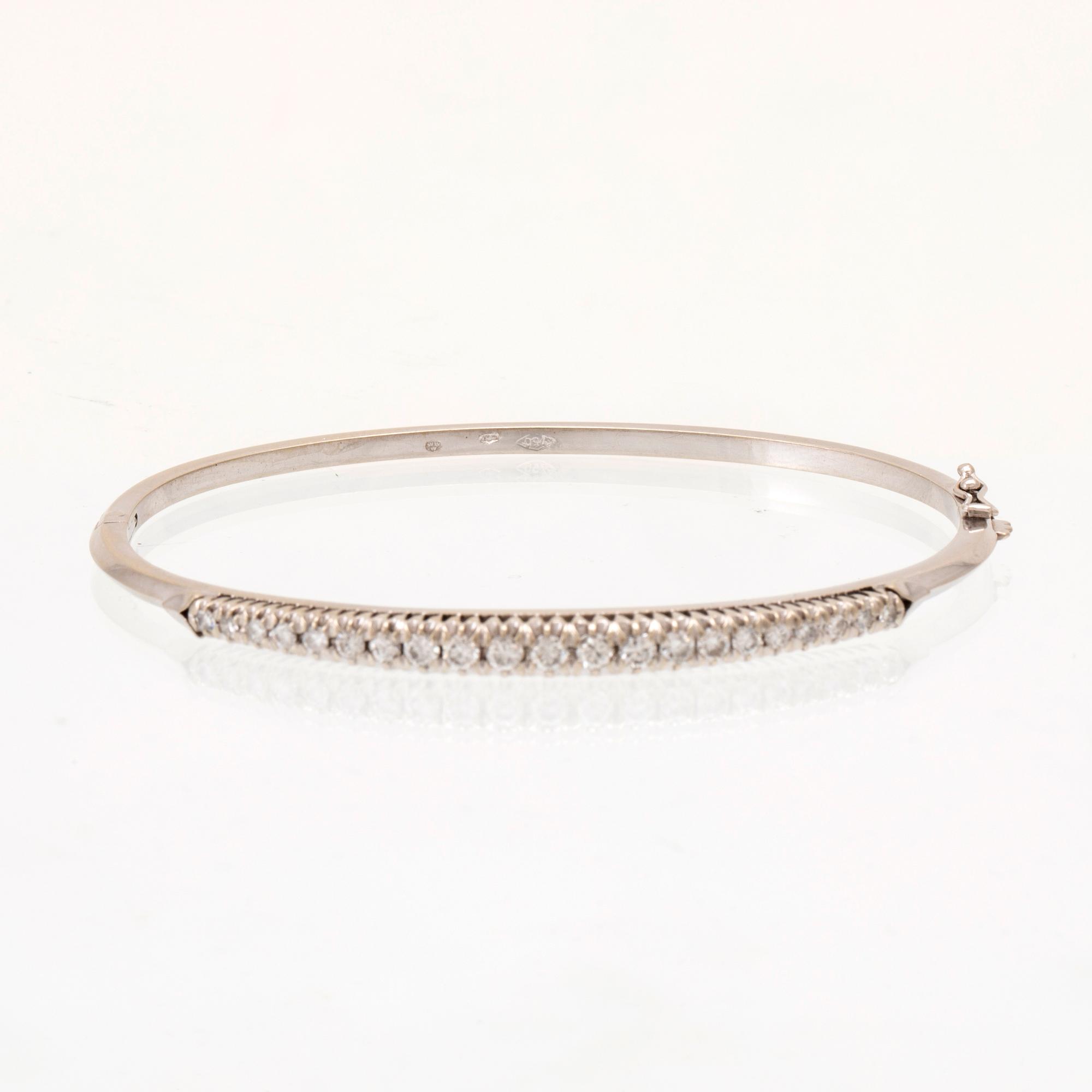 Stelt armband 18K vitguld med runda briljantslipade samt enkelslipade diamanter, Italien.