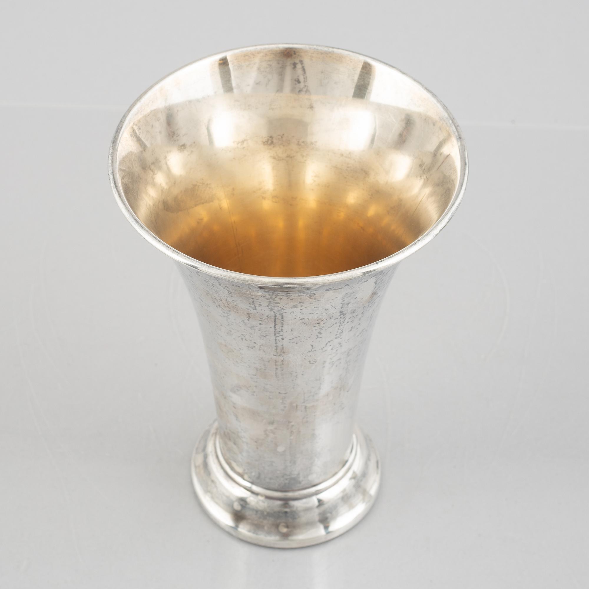 A set of three Swedish silver beakers, including CG Hallberg, Stockholm 1951.