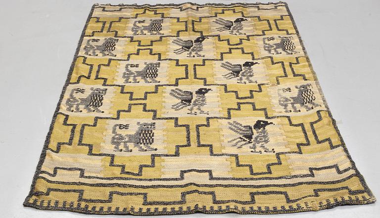Elsa Gullberg, draperi/vävnad, "Lejon och Gripar", slätväv med reliefdekor av knutar, ca 228,5-230 x 148,5-153,5 cm.