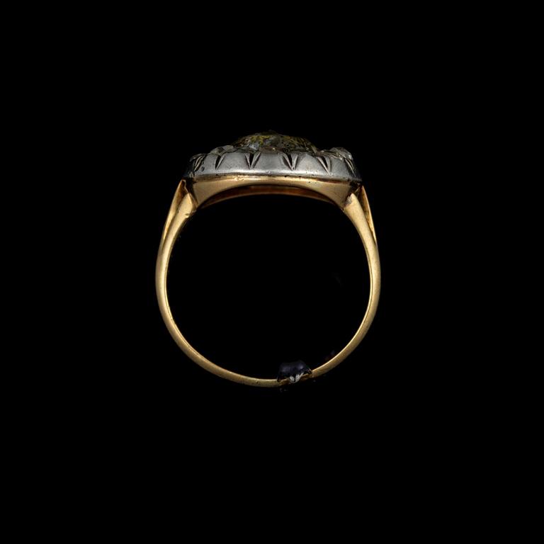 A RING, 18K gold and silver, old cut diamonds, 18th/19yh century, 1930´s.