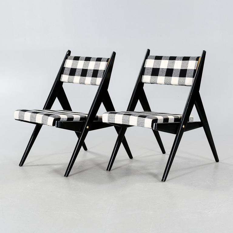 A pair of mid 20th century chairs.